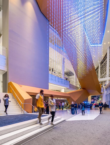 People walking on a walkway.